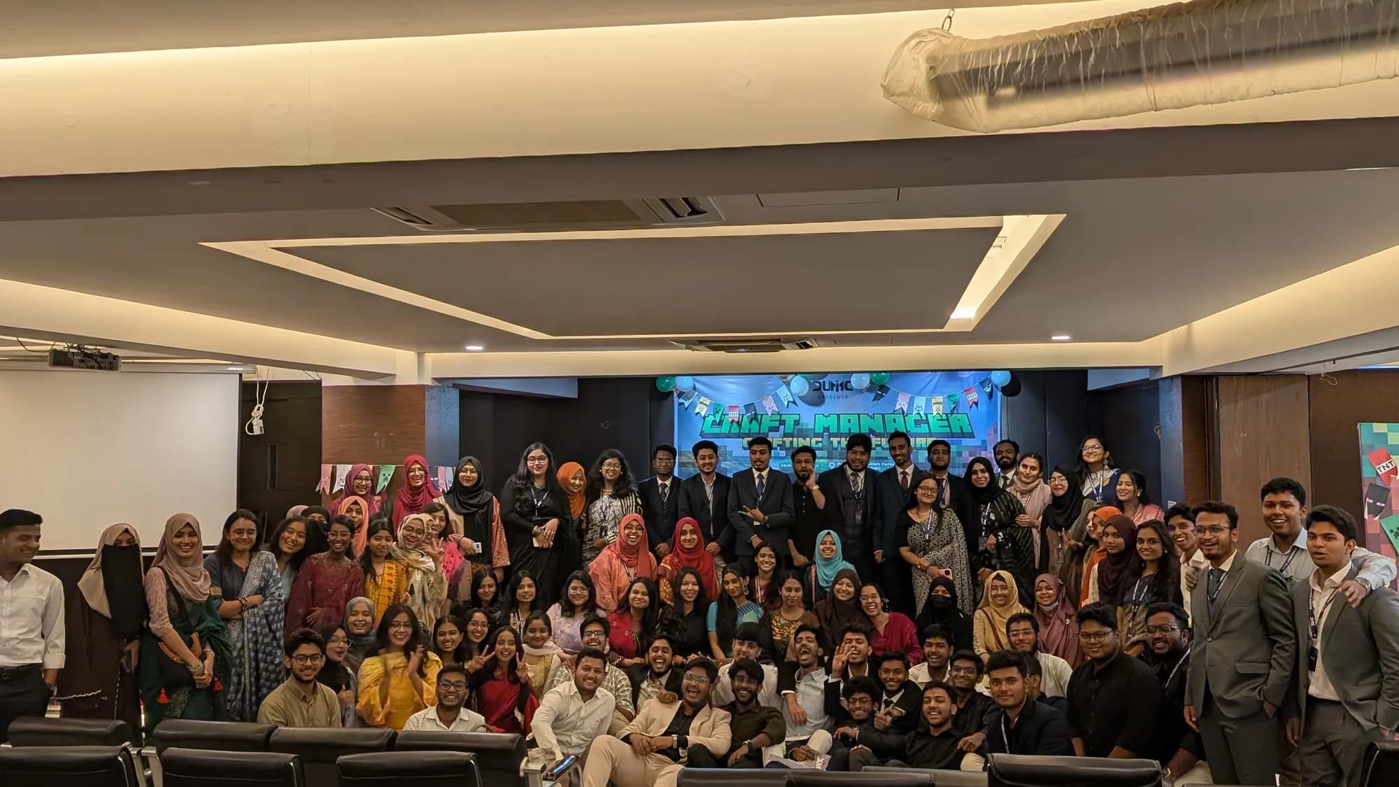 Members and guests of DUMC gathered for a group photo at an event, 26 September 2026